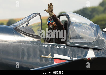 Eric Goujon taxiing in the Red Bull sponsored Vought Corsair at the Flying Legends Air Show at IWM Duxford Stock Photo