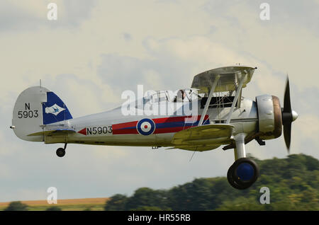 Gloster Gladiator biplane at the Flying Legends Air Show at IWM Duxford, UK. 1930s & Second World War biplane fighter plane Stock Photo