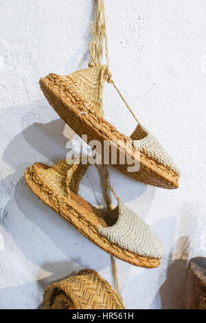 A pair of espadrilles, made of Esparto, halfah grass, or esparto grass in Ethnological Museum Mijas, Andalusia, Spain Stock Photo