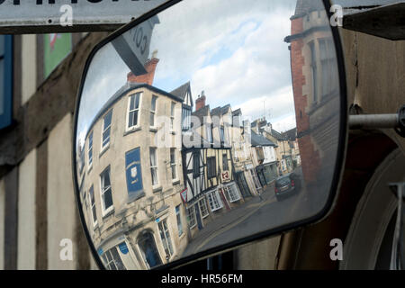 A road safety convex mirror in Winchcombe town centre, Gloucestershire, England, UK Stock Photo