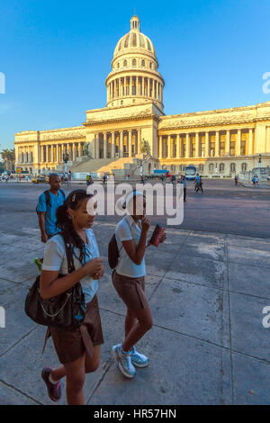 HAVANA, CUBA - APRIL 2, 2012: Group of uniformed cuban students in front of Capitolio building Stock Photo