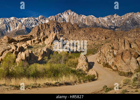 Eastern Sierra Nevada, Lone Pine Peak in center, Mount Whitney on right, view from Movie Road in Alabama Hills at sunrise, near Lone Pine, California, Stock Photo