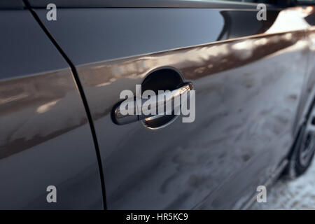 external handle of opening of a car door close-up Stock Photo