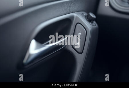 Button lock car doors and door openers Stock Photo