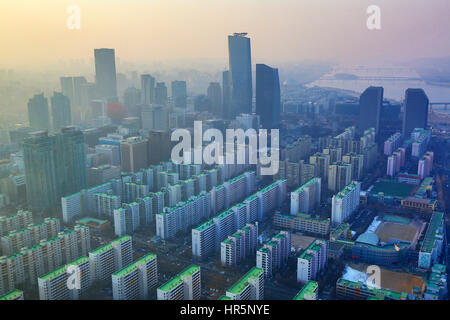 General view of blocks of flats and the Seoul city skyline at dusk in Seoul, Korea Stock Photo