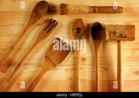 Flat lay variety of wooden cutlery  on wooden rustic background top view close up Stock Photo