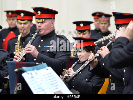 The Grenadier Guards Band practice their musical sequence that was meant to be played at the changing the Guard ceremony outside Buckingham Palace, but which was changed to Wellington Barracks close by because of the weather, in Westminster central London. Stock Photo