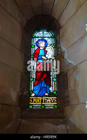 Stained glass depicting St. Matthæus (Matthew) the Evangelist Buckfast Abbey Devon England UK Stock Photo