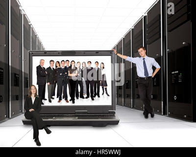 business online network team - 3d servers and a huge business team on a laptop Stock Photo