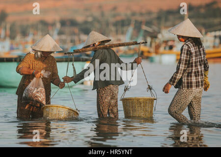 PHAN THIET, VIETNAM - November 9, 2016: Fishermen in Phan Thiet on November 9, 2016, Vietnam. Stock Photo