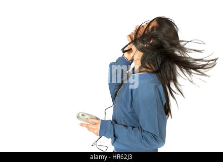 girl listening to music over a white background Stock Photo