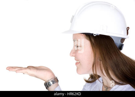 female architect holding something on her hand over a white background Stock Photo