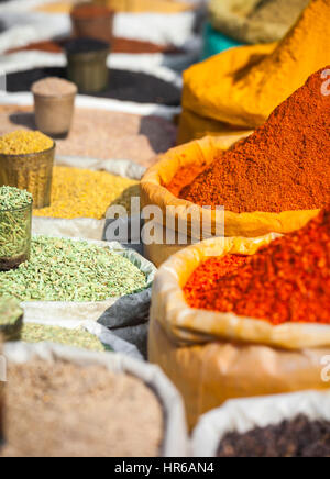 Colorful spices powders and herbs in traditional street market in Delhi. India. Stock Photo