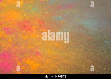 Holi colours on black background Stock Photo