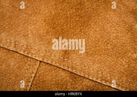 Scratched worn suede texture with seam Stock Photo