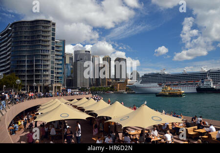 The Cruise Ship (Carnival Legend) Moored at Circular Quay in Sydney Harbour from the Opera Bar, New South Wales, Australia. Stock Photo