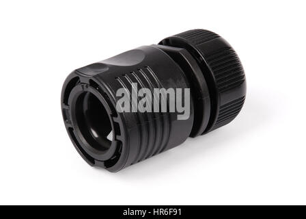 Black garden water hose nozzle and connectors isolated on white background with soft shadow. Photo with clipping path Stock Photo