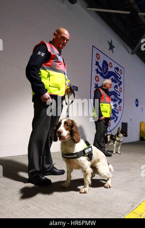 London, UK. 26th Feb, 2017. A highly visible security presence inside the stadium. Dogs (explosive search) patrol the bowels of the stadium before the EFL Cup Final between Manchester United and Southampton, played at Wembley Stadium on February 26, 2017. Credit: Paul Marriott/Alamy Live News Stock Photo