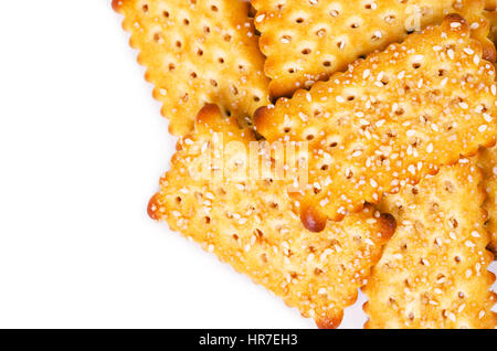 Close up crackers with white sesame seeds isolated on white background. Stock Photo