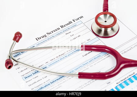 Drug test report form with Medical stethoscope on white background. Stock Photo