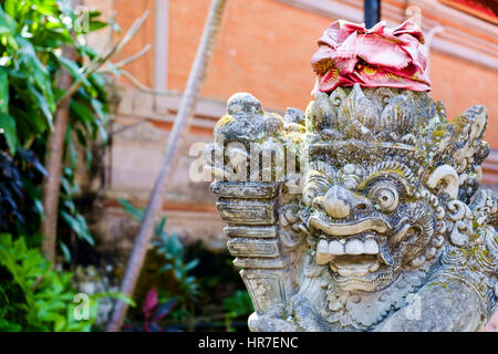 Guardian gate statue (Bedogol, or Dvarapala) at a traditional Balinese family compund, Ubud, Bali, Indonesia. Stock Photo