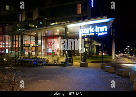 OSLO, NORWAY - JAN 20th, 2017: Night shot of the entrance and facade to a luxury european airport hotel PARK INN  Stock Photo