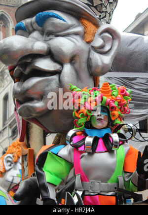 AALST, BELGIUM, FEBRUARY 26 2017: Colorfully dressed unknown female dancer during the annual carnival parade in Aalst. Stock Photo