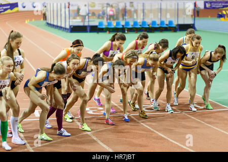 SUMY, UKRAINE - FEBRUARY 17, 2017: start of final race 3000m on Ukrainian indoor track and field championship 2017 Stock Photo