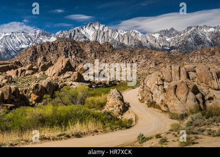 Lone Pine Peak in center, Mount Whitney on right in Eastern Sierra Nevada view from Movie Road in Alabama Hills, near Lone Pine, California, USA Stock Photo