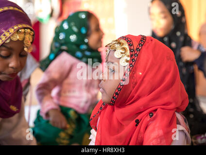 Muscat, Oman - Feb 4, 2017: Young Omani girl during a traditional wedding ritual display at Muscat cultural festival. Stock Photo