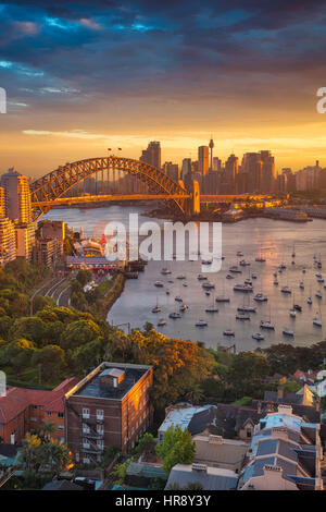 Sydney. Cityscape image of Sydney, Australia with Harbour Bridge and Sydney skyline during sunset. Stock Photo