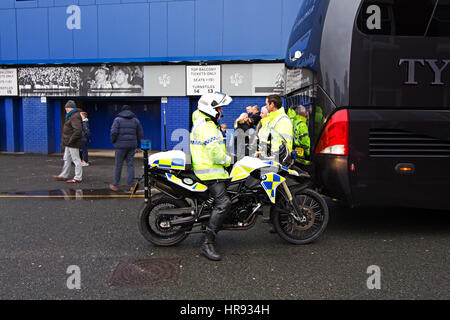 Police officers on crowd control duty as fans start to arrive at Goodison Park for Everton's home match against Sunderland, Liverpool UK. Stock Photo
