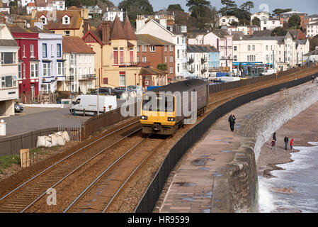 Passenger train passing through the seaside town of Dawlish in South Devon England UK Stock Photo