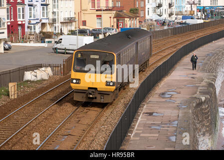 Passenger train passing through the seaside town of Dawlish in South Devon England UK Stock Photo