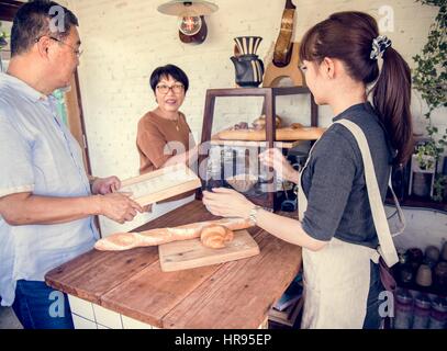 Small bakery business buying customer Stock Photo