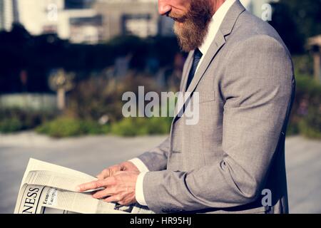 Businessmen Read Hands Hold Newspaper Stock Photo