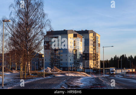 UMEA, SWEDEN ON DECEMBER 20, 2016. View of a modern suburban settlement, buildings, street, walkway, traffic. Editorial use. Stock Photo