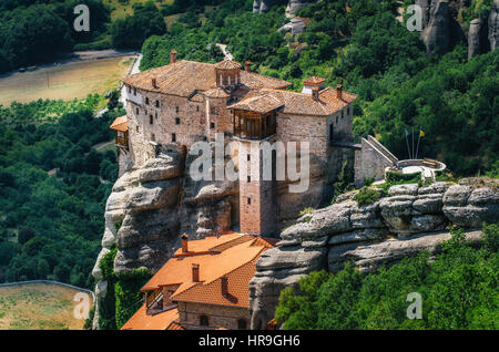 Mountain scenery with Meteora rocks and Roussanou Monastery, landscape place of monasteries on the rocks, orthodox religious greek landmark in Thessal Stock Photo