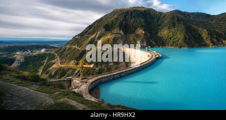 The Enguri hydroelectric power station HES. The wide Inguri River Jvari Reservoir next to Enguri Dam, surrounded by mountains, Upper Svaneti, Georgia. Stock Photo