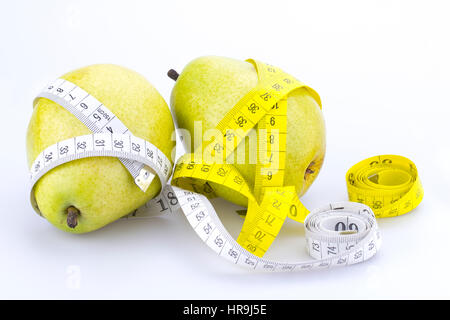 Two pears and measuring tapes isolated on white Stock Photo