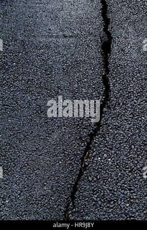 Cracked Asphalt Surface Background Stock Photo
