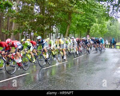 Tour de France 2015, Stage 5, peloton fights to keep on track during heavy rain on the route through Vimy Ridge, Canadian WWI Memorial, France. Stock Photo
