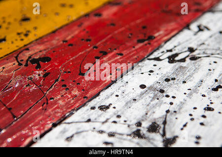 Patterned and textures background of brightly colored panels of weathered painted wooden boards Stock Photo