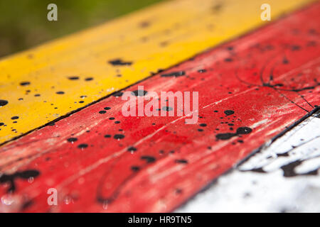 Patterned and textures background of brightly colored panels of weathered painted wooden boards Stock Photo