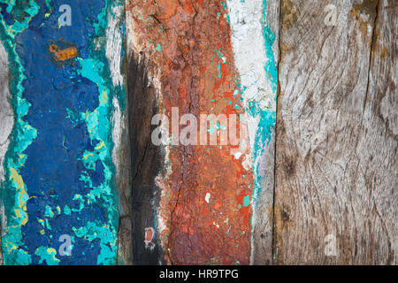 Patterned and textures background of brightly colored panels of weathered painted wooden boards Stock Photo