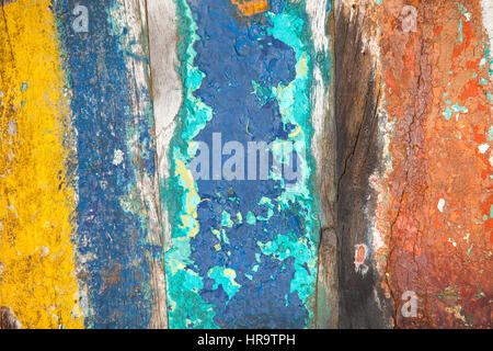 Patterned and textures background of brightly colored panels of weathered painted wooden boards Stock Photo