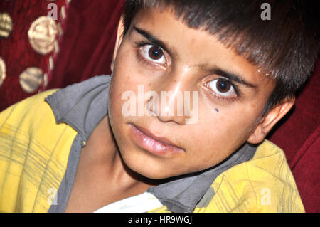 Kashmiri Boy, Kashmir India (Photo Copyright © by Saji Maramon) Stock Photo