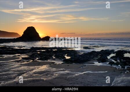 Black Rock beach at sunset, Widemouth Bay, near Bude, Cornwall, UK, November 2014. Stock Photo