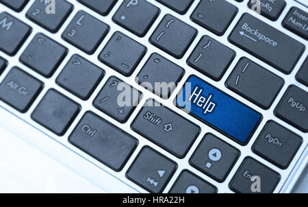 Keyboard with blue key button - Help Stock Photo