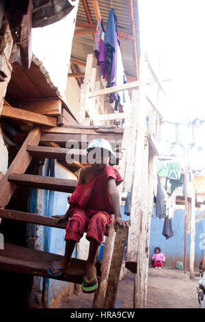 Orphan in the orphanage, Kibera slums, Nairobi, Kenya, East Africa Stock Photo